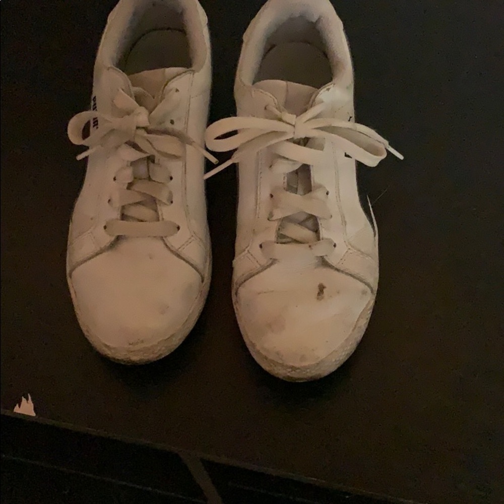 White Puma sneakers with black stripes